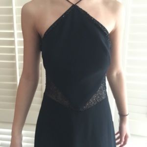 Dazzling  evening gown.  For a small frame.